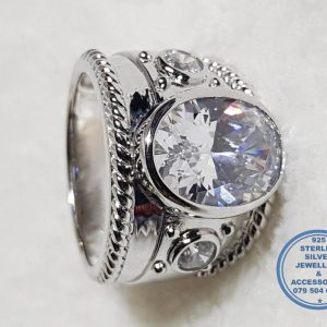 925 Sterling Silver Ring Super Statement Showstopper with cubic Zirconia detail OVAL  with a round stone detail on each side