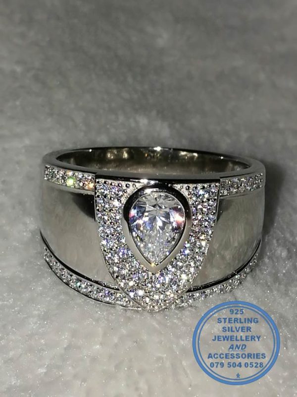 "925 Sterling Silver Ring with dramatic teardrop cubic set in middle of many cubics in a v shape"