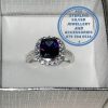 925 Sterling Silver Ring with Halo Large Blue Rectangular cubic and cubics down sides
