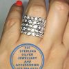 925 Sterling Silver Ring with 5 bands as 1 with multiple tube set cubics per row. Bold Statement. Stunner