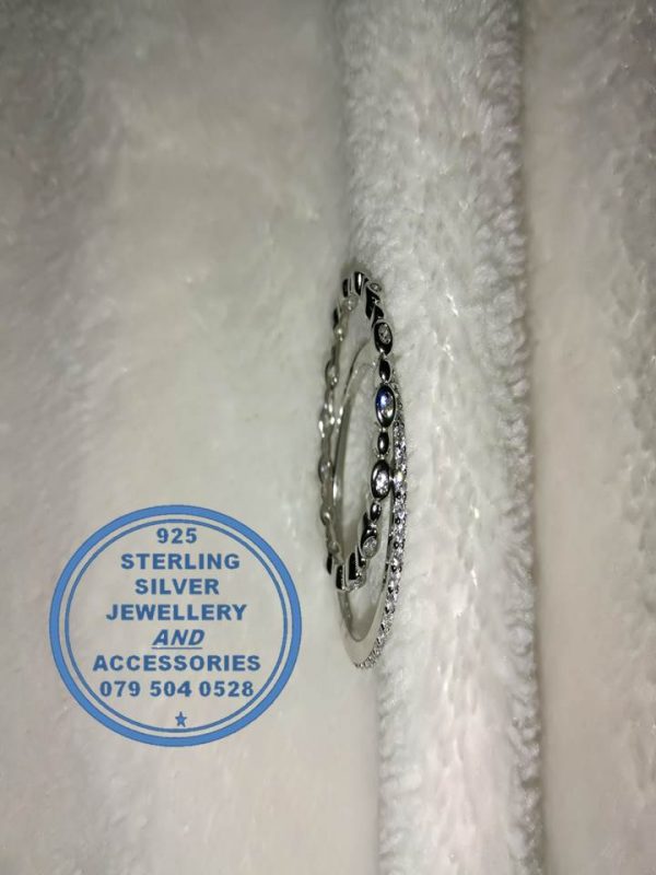 "925 Sterling Silver 2 set bands with cubic detail. 1 with round tube settings"