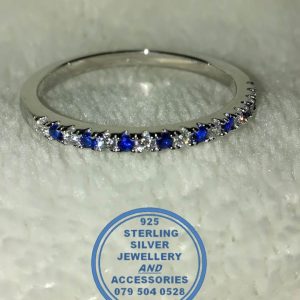 "925 Sterling Silver and blue and clear cubics on top Wedding Band or Stack Ring."