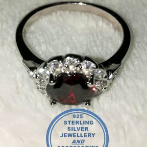 "925 Sterling Silver Ring with round Red Cubic with clear cubic setting around"