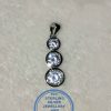925 Sterling Silver Pendant with 3 clear round Cubics in a column down 3 sizes.