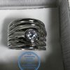 925 Sterling Silver Broad Ring with detail of 7 bands as 1 Ring with large round cubic stone in tubular setting. Statement Ring.