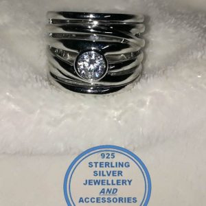 "925 Sterling Silver Broad Ring with detail of 7 bands as 1 with large round cubic stone in tubular setting. Statement Ring."