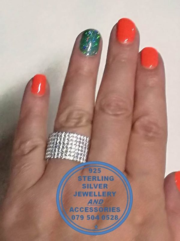 925 Sterling Silver Ring with 7 rows of Clear Cubic as 1 ring. Showstopper.