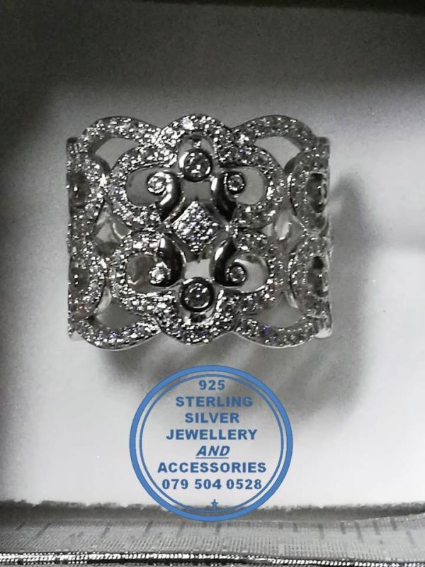 "925 Sterling Silver Ring with cubics set in multiple roundings. Showstopper statement Ring."