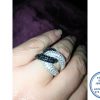 "925 Sterling Silver Statement Designers Ring with interlocked clear and black cubic bands"