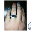 925 Sterling Silver Ring with Extra  Large Blue Rectangular cubic with clear cubics all around and going down on sides of this ring. Middle Blue Baguettes
