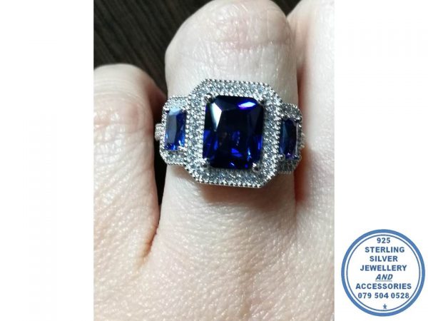 925 Sterling Silver Statement Ring with 3 Blue Rectangular Halo Cubic. Large Middle and side Rectangular Blue Cubic with Clear Cubic Halo. Stunning inside detail