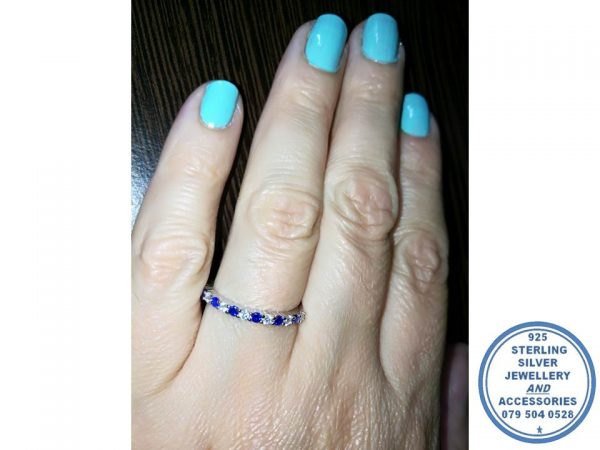 925 Sterling Silver Designer's Wedding Ring blue and clear round cubics