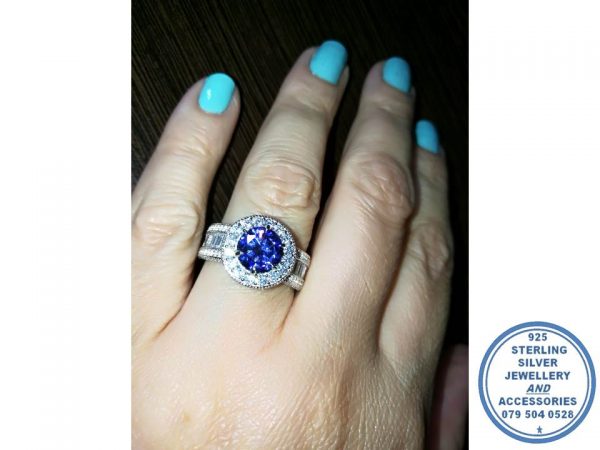 925 Sterling Silver Statement Sophisticated Royal Blue Round Halo Ring  with clear side baguette detail