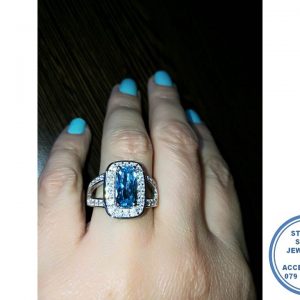 925 Sterling Silver Ring with Extra  Large AQUA Blue Rectangular cubic with clear cubics all around and going down on sides of this ring