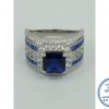 925 Sterling Silver Ring Showstopper Royal Blue Square Halo with 2 Blue Rows Baguette and curly inside detail with 2 clear side cubic detail. All as 1 Ring. Statement